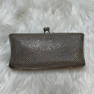 Bebe silver clutch